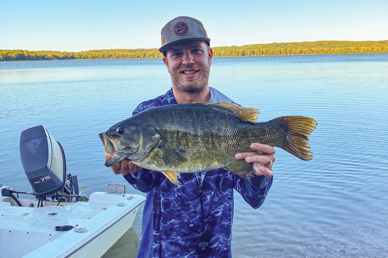 //content.osgnetworks.tv/flyfisherman/content/photos/McCormack-8lb-Smallmouth.jpg